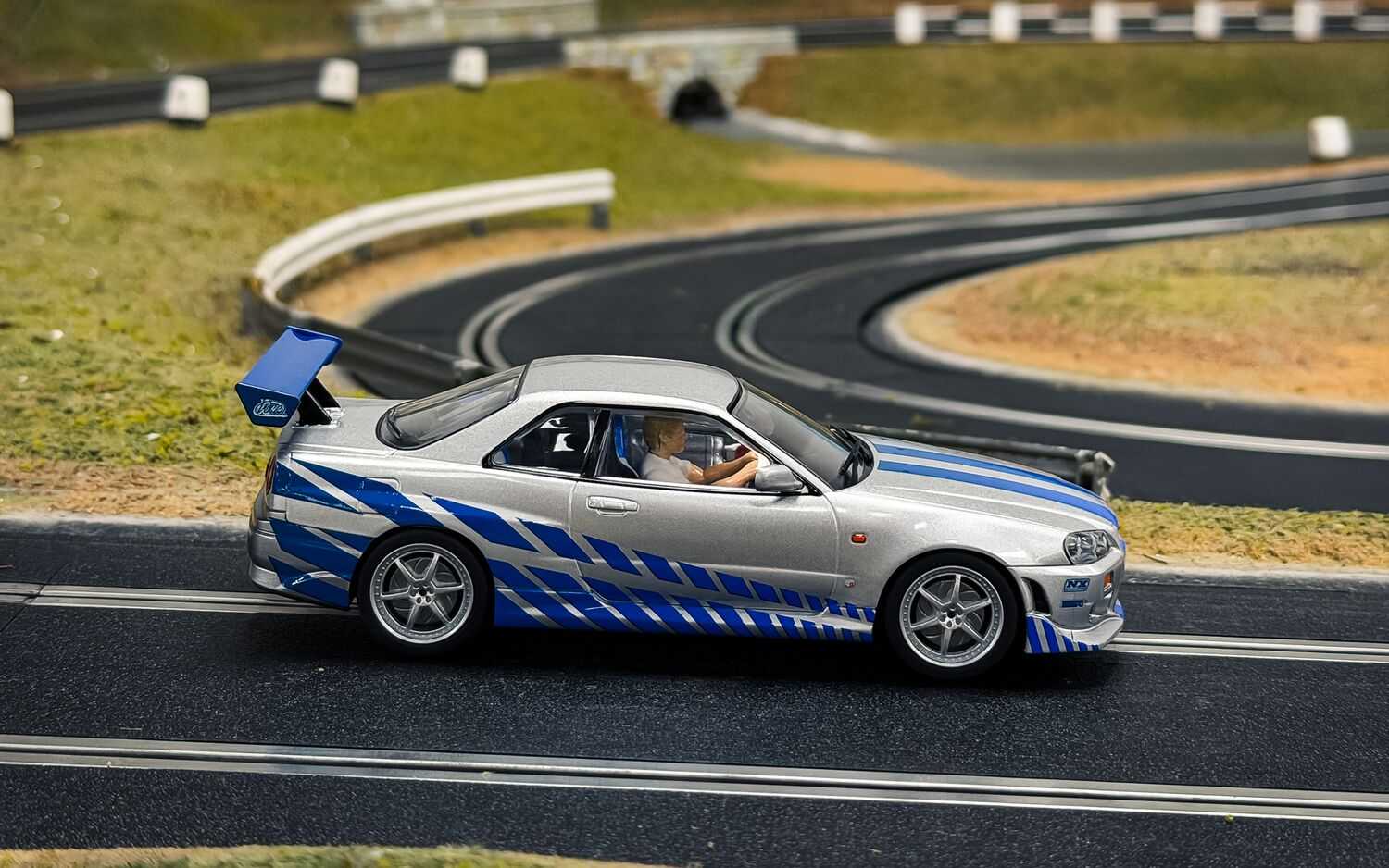 Autíčko Film & TV SCALEXTRIC C4674 - Nissan R34 Skyline - 2Fast 2Furious (1:32)